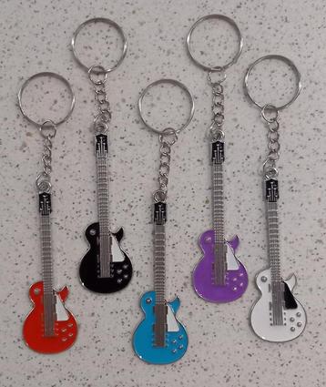 Grote gitaar sleutelhangers "nieuw" ook leuk als traktatie  beschikbaar voor biedingen