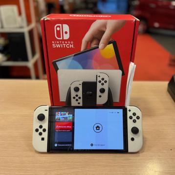 Nintendo Switch console OLED in doos met een jaar garantie beschikbaar voor biedingen
