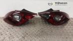Achterlichtset links + rechts van een Opel Corsa (Corsa D 07, Ophalen of Verzenden, 3 maanden garantie, Gebruikt, Opel