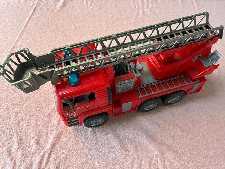Bruder MAN brandweerwagen, Kinderen en Baby's, Speelgoed | Speelgoedvoertuigen, Gebruikt, Ophalen of Verzenden