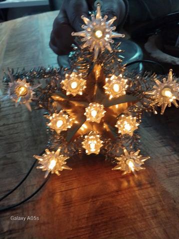 Een leuk vintage verlichte kerstster  beschikbaar voor biedingen