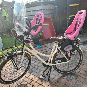 Damesfiets met 2 kinderzitjes beschikbaar voor biedingen