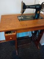 Oudetrap naaimachine, Ophalen