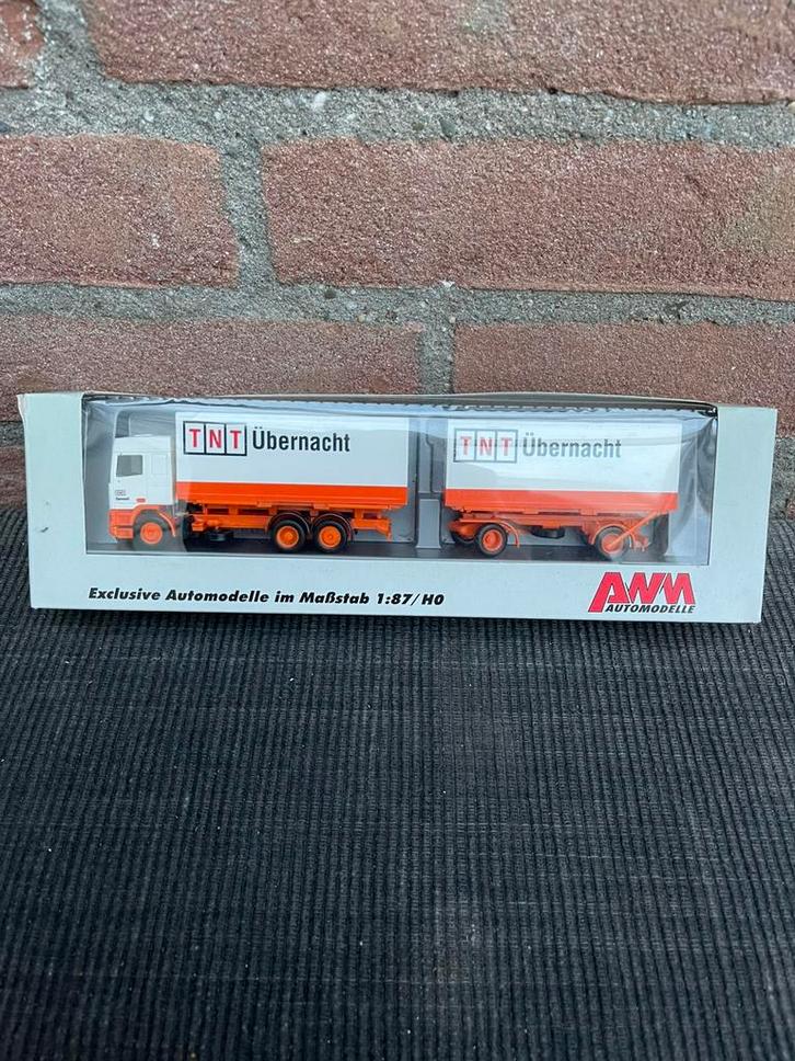 1:87 HERPA DAF COMBINATIE TNT + AFZETCONTAINERS, Hobby en Vrije tijd, Modelauto's | 1:87, Zo goed als nieuw, Bus of Vrachtwagen