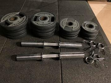 Loadable olympische dumbells en 55kg schijven beschikbaar voor biedingen