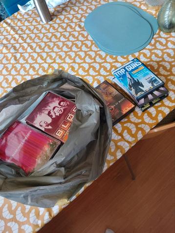 Te koop een zak met 36 bespeelbare DVD's in een koop!!! beschikbaar voor biedingen