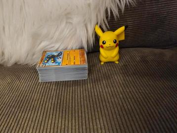 101 pokemon kaarten en pikachu poppetje  beschikbaar voor biedingen