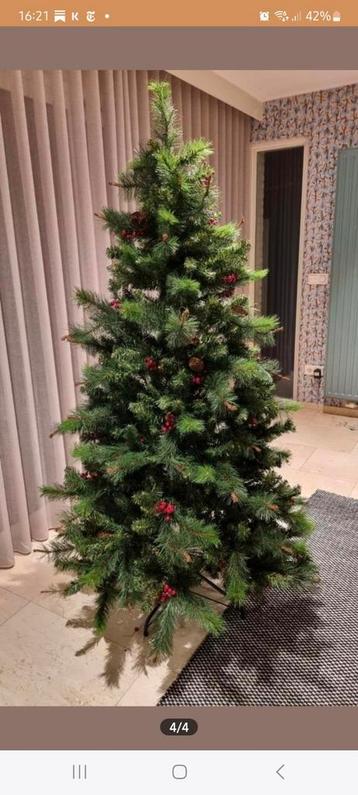 Mooie kerstboom 1.80 m beschikbaar voor biedingen
