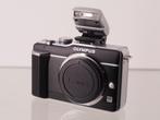 Olympus E-PL1 body + gratis FL-LM1 flitser, Ophalen of Verzenden, 1980 tot heden, Fototoestel