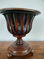 Theestoof met messingen pot, Ophalen