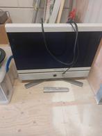 Loewe tv met afstandsbediening, Ophalen