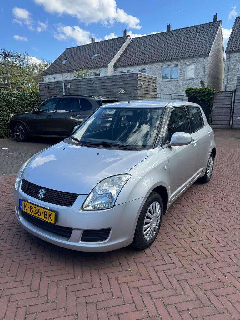 Suzuki Swift 1.3 2009 - Airco, Bluetooth, Stoelverwarming, Voorwielaandrijving, 40 €/maand, 400 kg, Swift