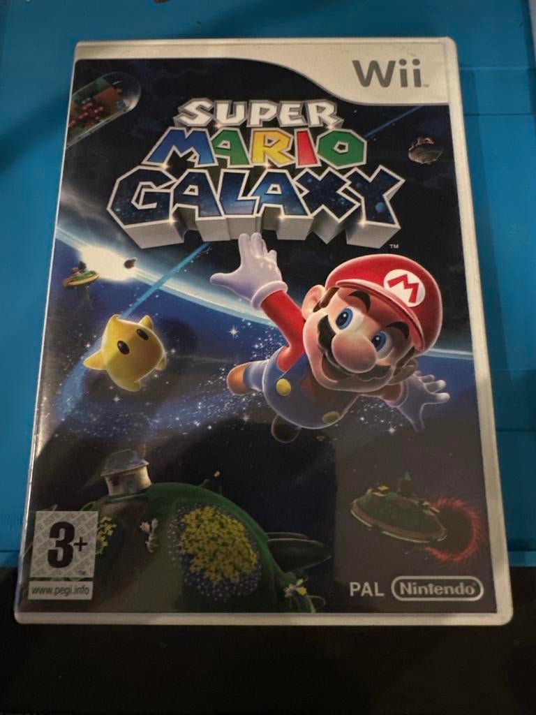 Super Mario Galaxy Wii - Nieuwstaat met boekje, Spelcomputers en Games, Games | Nintendo Wii, 1 speler, Ophalen of Verzenden, Zo goed als nieuw
