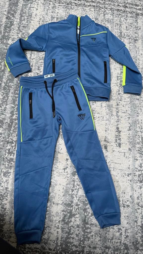Ravagio trainingspak blauw/neon geel maat 116/122, Kinderen en Baby's, Kinderkleding | Maat 116, Ophalen of Verzenden, Zo goed als nieuw