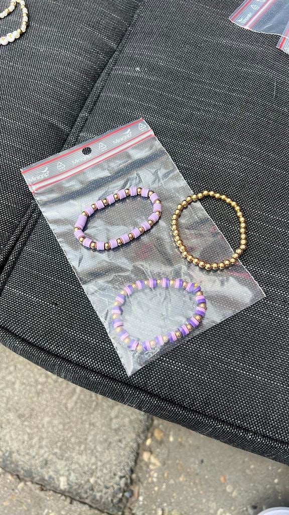 Goude+paarse armbandjes, Ophalen of Verzenden, Zo goed als nieuw, Paars, Elastiek