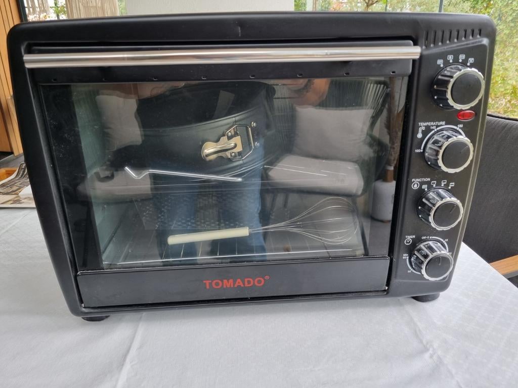 Tomado oven 1500 Watt, Ophalen