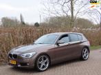 BMW 1-serie 116i EDE Upgrade Edition *Leer *Navi, Auto's, 1-Serie, Euro 5, Gebruikt, Zwart