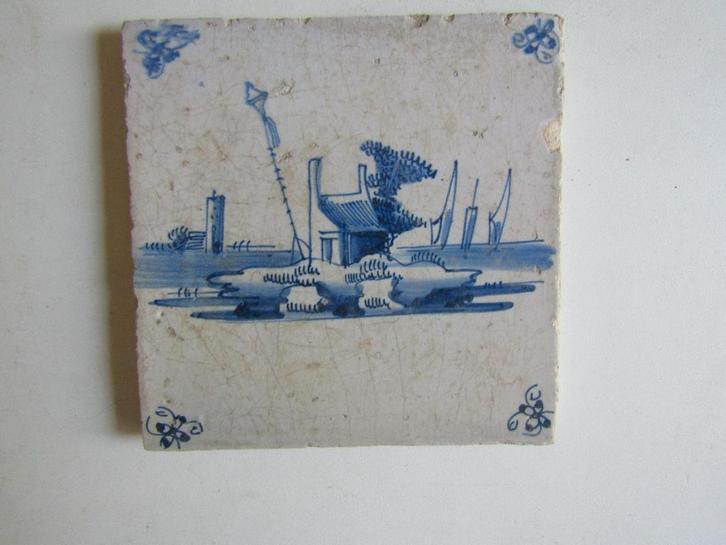 een antieke tegel met een huisje op een terpje., Antiek en Kunst, Antiek | Wandborden en Tegels, Ophalen of Verzenden