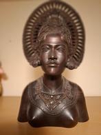 Indonesisch handgesneden buste, Ophalen