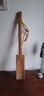 Houten schep, Ophalen