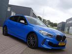 BMW 1-serie M135i xDrive High Executive PANORAMADAK|HEAD-UP, 1998 cc, Gebruikt, 4 cilinders, Blauw