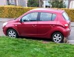 Hyundai i20 1.4 5-DRS 2010 Rood, Auto's, Hyundai, Voorwielaandrijving, 450 kg, Zwart, 4 cilinders