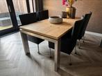 4 zwarte leren verrijdbare eetkamerstoelen + eettafel, Ophalen, Zo goed als nieuw