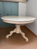 Ronde houten tafel, Ophalen