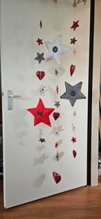 Handgemaakte kerstslinger met sterren en hartjes, Ophalen