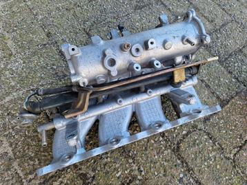 Mitsubishi Evo 8 OEM inlaat spruitstuk beschikbaar voor biedingen