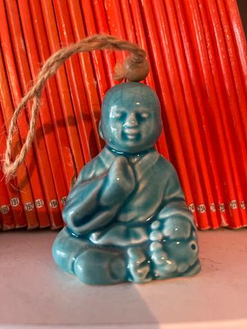 Klein Hangend Boeddhabeeldje beschikbaar voor biedingen