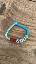 Ajax armbandje, Sieraden, Tassen en Uiterlijk, Armbanden, Overige kleuren, Ophalen of Verzenden, Zo goed als nieuw, Elastiek