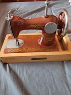 Mini naaimachine, Ophalen