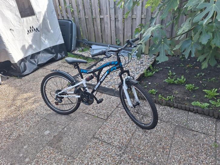 24 inch mountainbike met geveerde voorvork en frame en 21 ve, Fietsen en Brommers, Fietsen | Jongens, Zo goed als nieuw, 24 inch