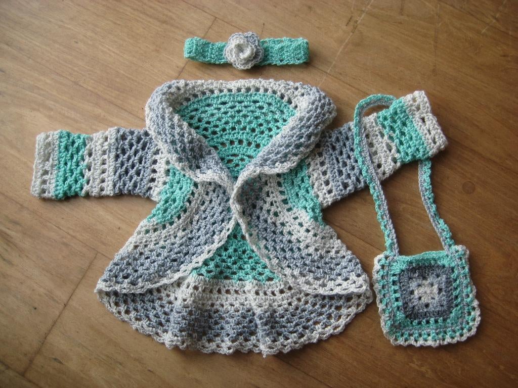 Opruiming: Nieuw gehaakt baby vestje m tasje maat 68 - 74, Ophalen, Nieuw, Meisje, Jasje