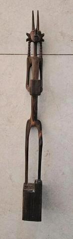 Afrikaans Houten Beeldje, Ophalen