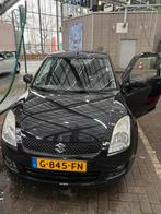 Suzuki Swift 1.3 3D 2009 Zwart, Auto's, Stoelverwarming, Stof, Handgeschakeld, Grijs
