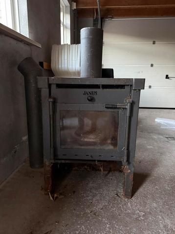 Houtkachel Janus 9kW | stevige gietijzeren kachel |opknapper beschikbaar voor biedingen