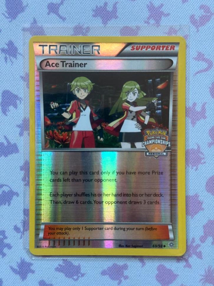 Ace Trainer Stamped Reverse Holo 69 Pokémon Ancient Origins, Hobby en Vrije tijd, Verzamelkaartspellen | Pokémon, Zo goed als nieuw
