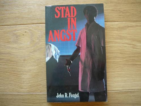 Te koop : stad in angst - john r. Feegel  tyrone lewis was e, Boeken, Detectives, Gelezen, Ophalen of Verzenden
