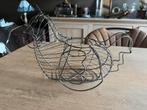 Metalen eiermand, Ophalen