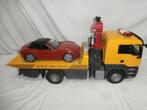 Bruder MAN oprijwagen met kraan en rode Roadster sportwagen, Ophalen, Zo goed als nieuw
