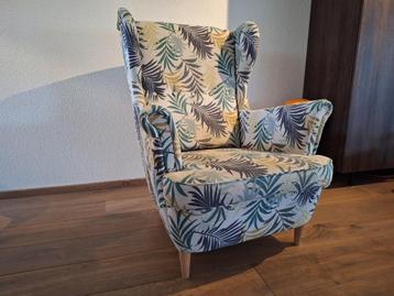 Ikea Strandmon oorfauteuil beige met groene bladeren jungle beschikbaar voor biedingen