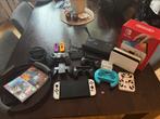 Nintendo Switch Oled met 2 spellen en veel accesoires, Spelcomputers en Games, Spelcomputers | Nintendo Switch, Switch OLED, Ophalen of Verzenden