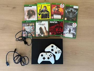 Xbox One X 1TB + 2 controllers + 8 top games beschikbaar voor biedingen