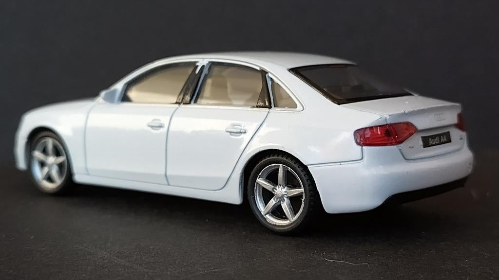 Audi A4 B8 1:43 Welly Pol, Overige merken, Auto, Verzenden, .