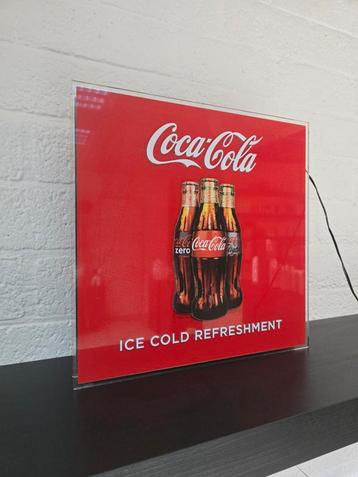 Coca Cola Lichtbord beschikbaar voor biedingen