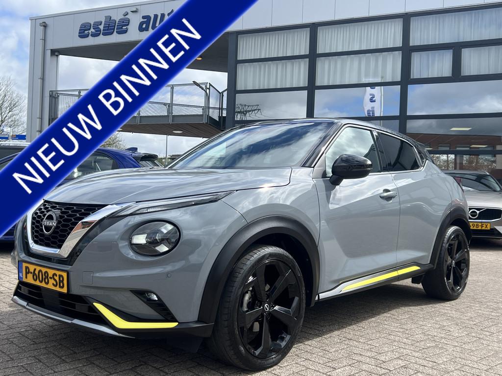 Nissan Juke 1.0 DIG-T Kiiro Navigatie Trekhaak Camera Carpla, Voorwielaandrijving, Stof, Met garantie (alle), Origineel Nederlands