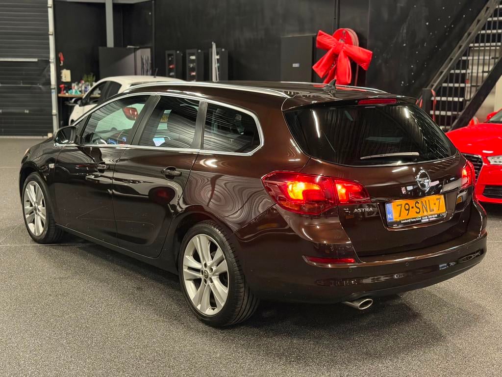 Opel Astra Sports Tourer 1.4 Turbo Sport NAVI/CRUISE/PDC/NAP, Euro 5, Stof, Gebruikt, 4 cilinders
