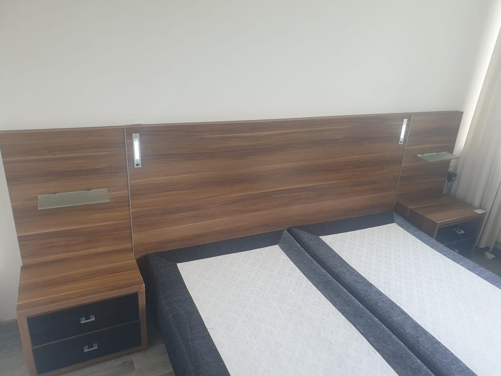 Bedden met een bijpassende kast, Ophalen